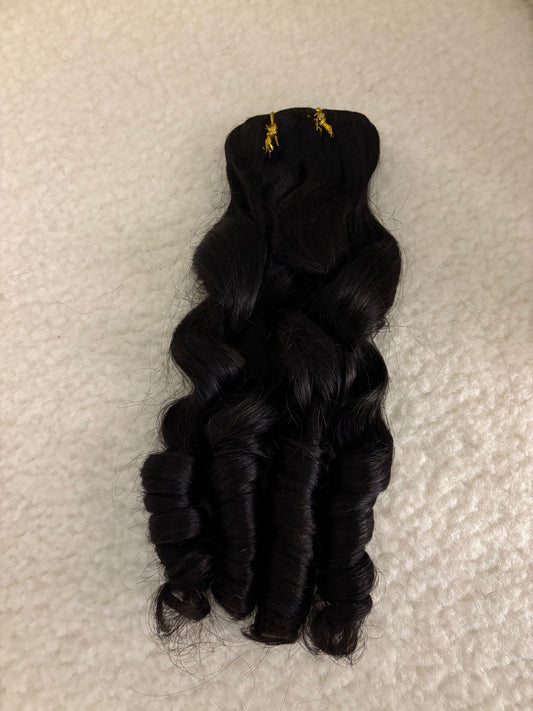 Weft clip in